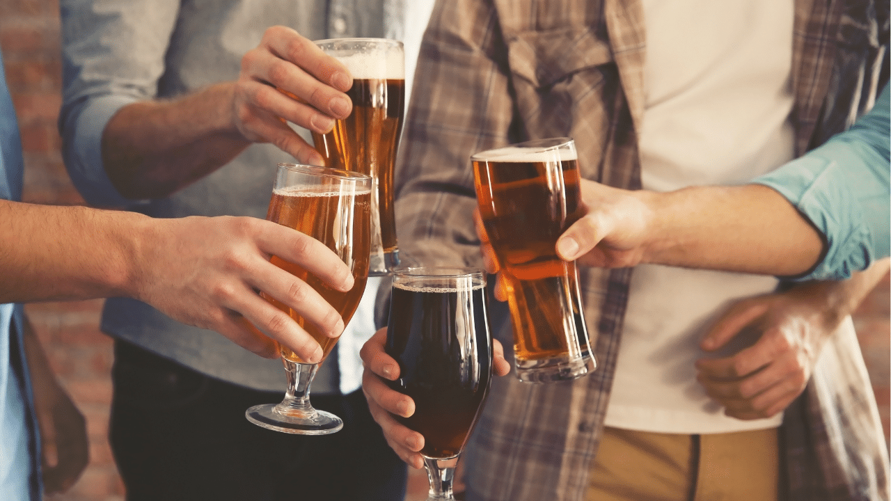 Men with pints of beer